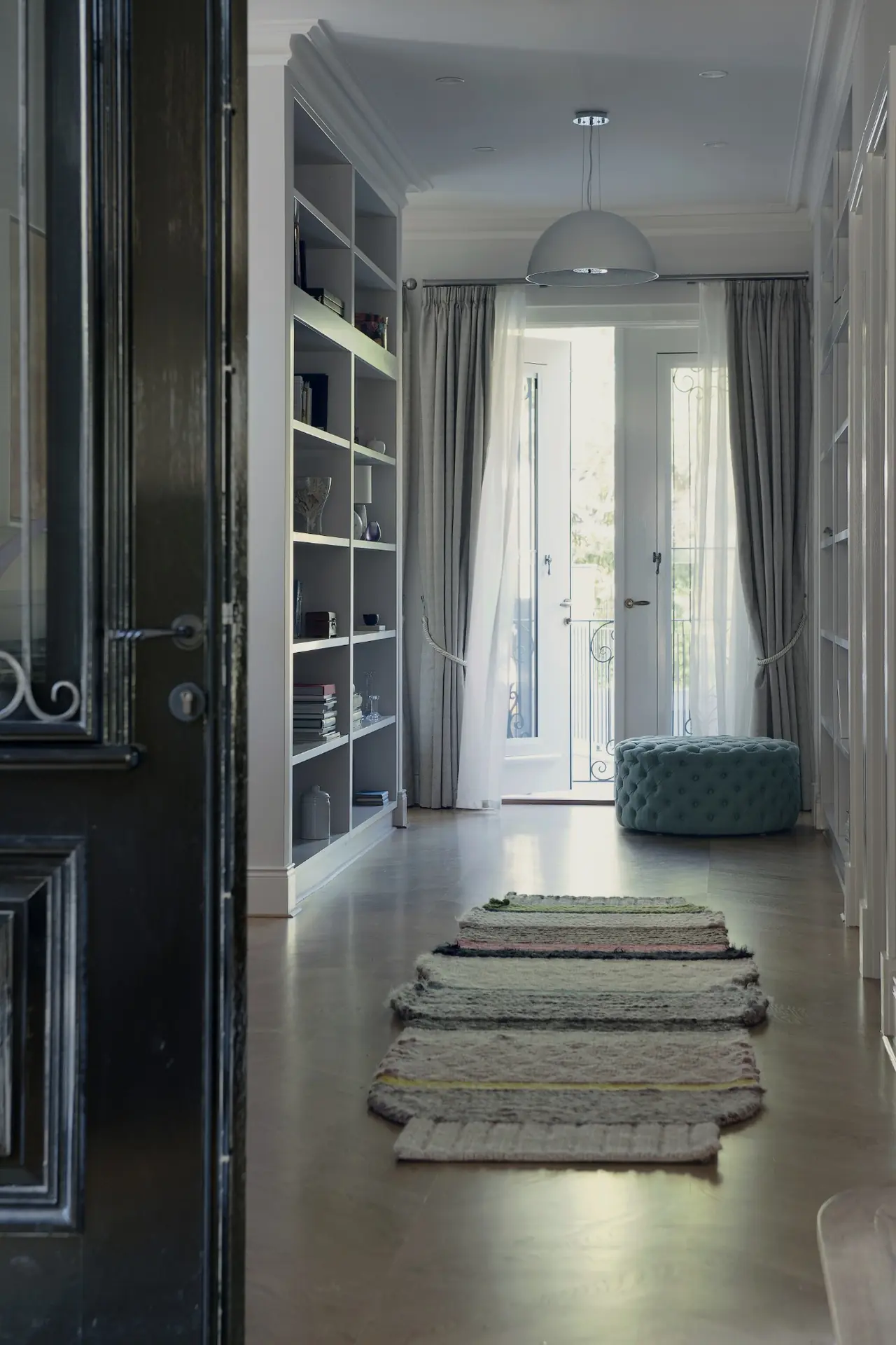 JF Design Dalkeith residence — entry hallway and library shelving, Perth interior design