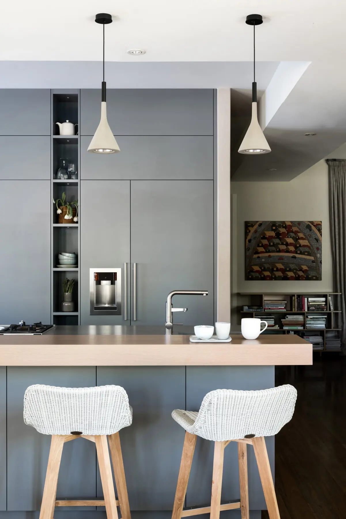 Close view of kitchen island and bar stools in Cottesloe residence, Perth