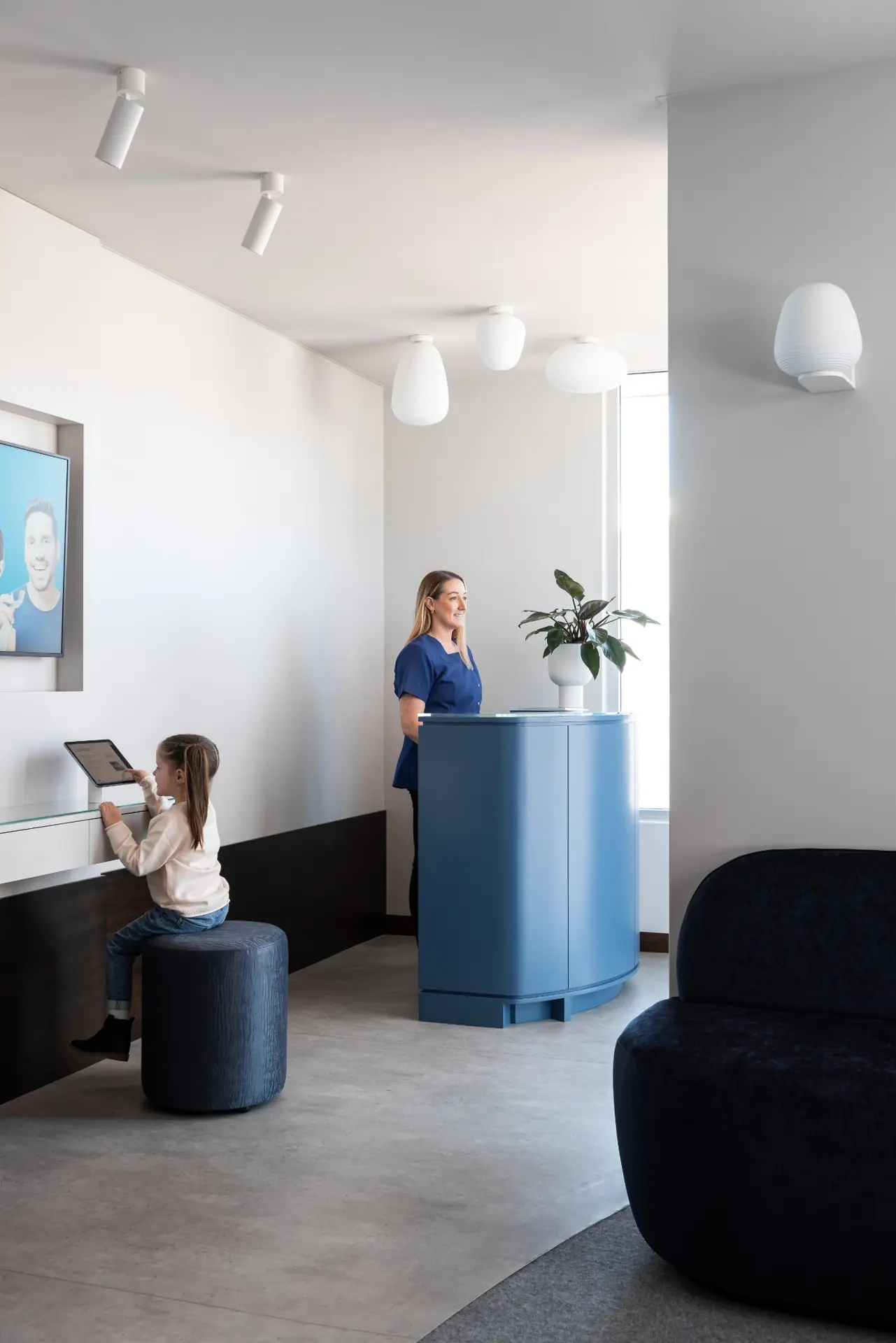 Reception with blue accent joinery in Profile Orthodontics, Perth