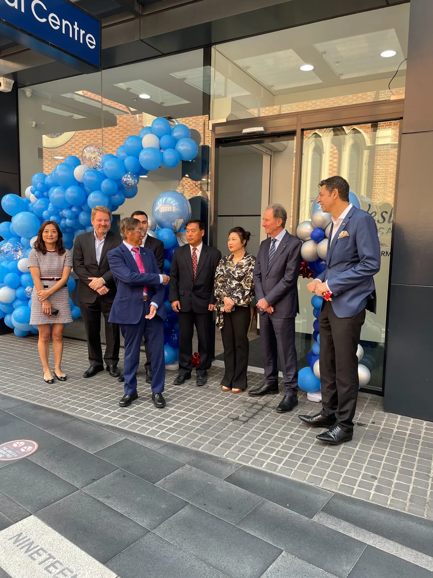 Entrance with people at opening ceremony in Wesley Quarter Medical Centre, Perth commercial interior design