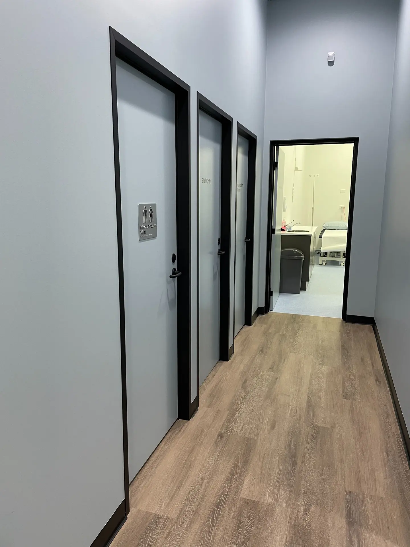 Hallway with timber flooring in Wesley Quarter Medical Centre, Perth
